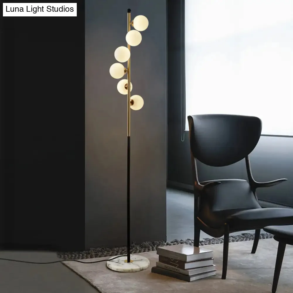 Minimalist Spiral Design - Gold and Black Ball Floor Lamp with 6-Bulb Cream Glass